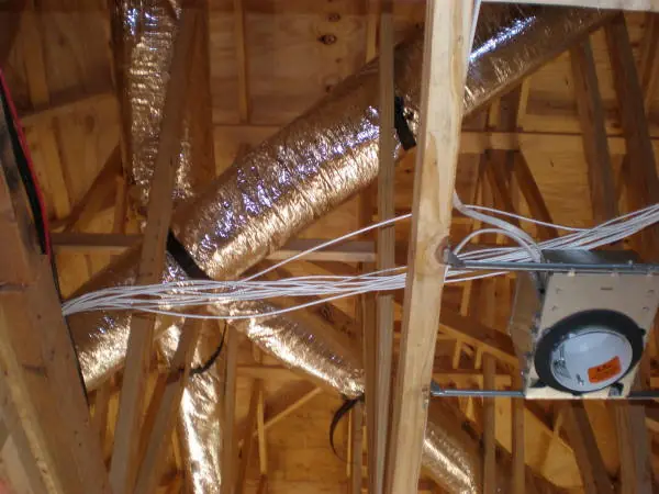 Unsealed attic framing and ductwork in Atlanta GA